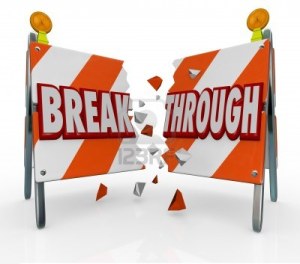 12583692-a-roadblock-barrier-or-barricade-is-split-as-you-break-through-the-obstacle-and-forge-ahead-to-get-w